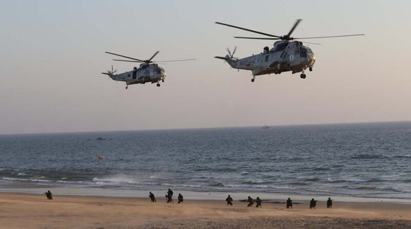 helicopter flying over soilders head