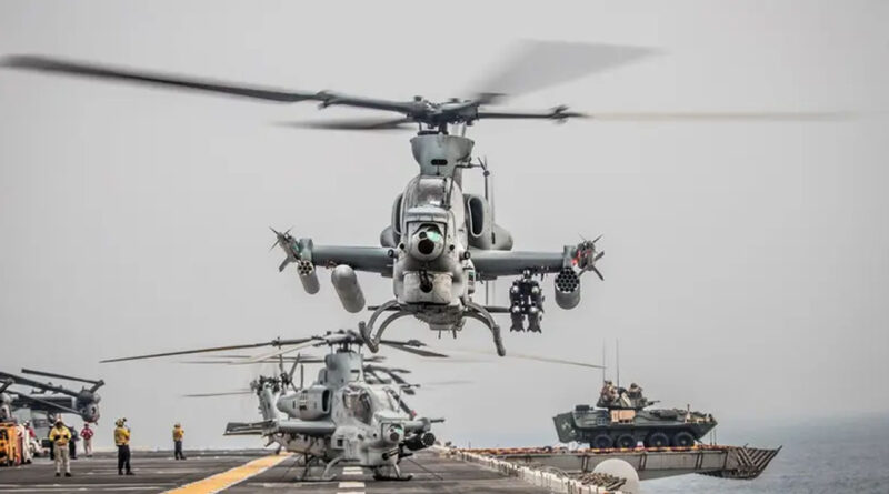 An AH-1Z Viper from the 11th Marine Expeditionary Unit (MEU) prepares for take-off aboard the amphibious assault ship USS Boxer