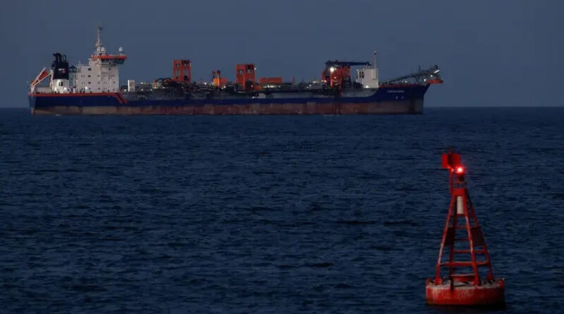 Rotterdam hopper dredger vessel operated by Van Oord sits anchored, as Iran vows to close the Strait of Hormuz, in Muscat