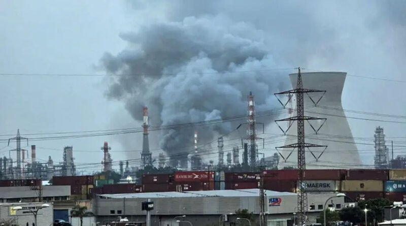 Smoke rises from an oil refinery that was damaged in an Iranian attack, in Haifa