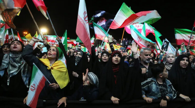 Iranians gather at Enqelab Square to protest against the United States and Israel in Tehran