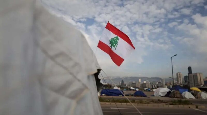 A Lebanese flag on a tent of displaced people, at a makeshift encampment, in Beirut, Lebanon, April 25, 2026