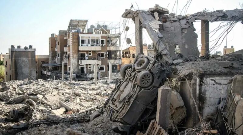 A photograph shows the aftermath of Israeli airstrikes in the Burj al-Chamali area near the southern city of Tyre