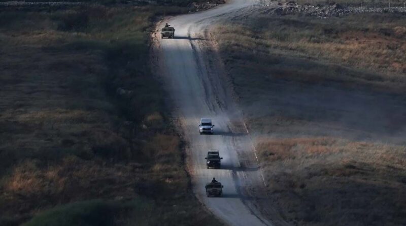Israeli military vehicles maneuver on the Lebanese side of the Israel-Lebanon border, as seen from the Upper Galilee, in northern Israel, 21 June 2026