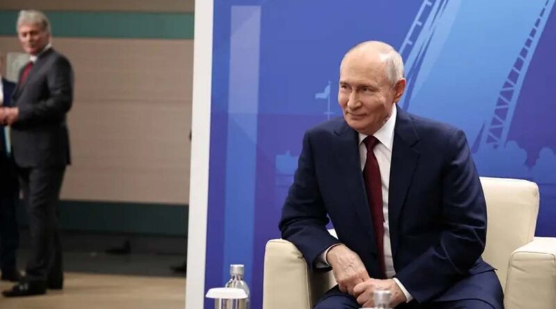 Russia’s President Vladimir Putin waits before a plenary session of the St. Petersburg International Economic Forum